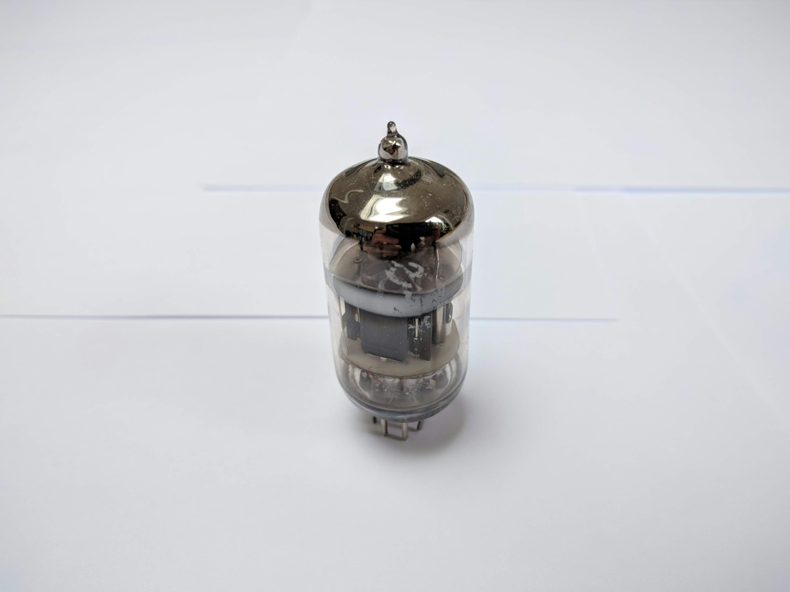 Side view of an electron beam evaporation source installed in a vacuum chamber.